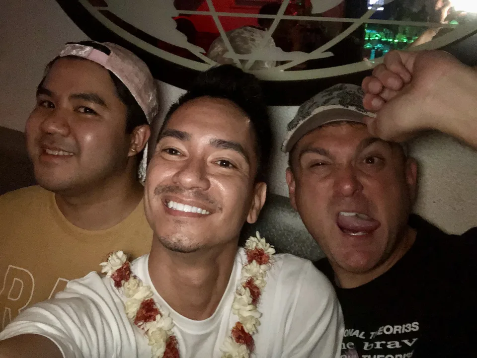 andre with lei and two friends close