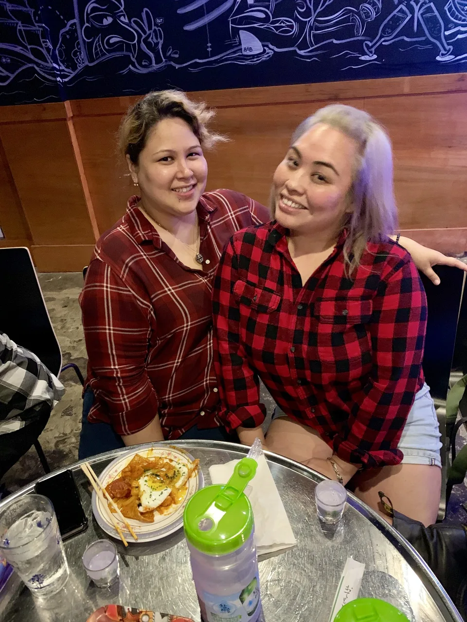 Two friends in plaid shirts