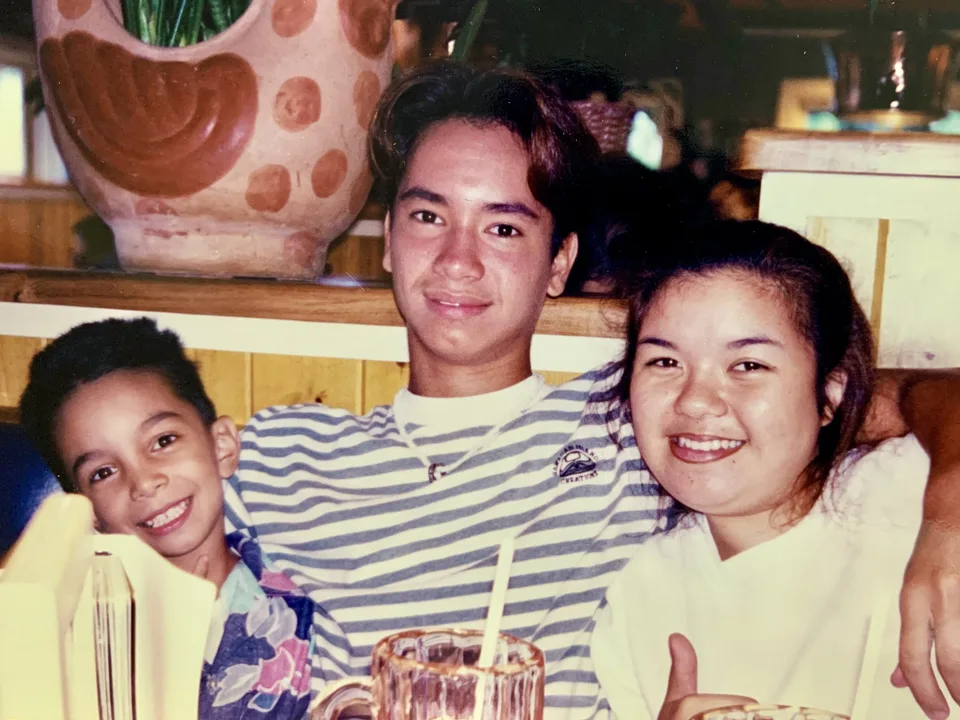 Three teens at a restaurant in the nineties